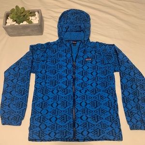 Child’s torrentshell hooded rain jacket.